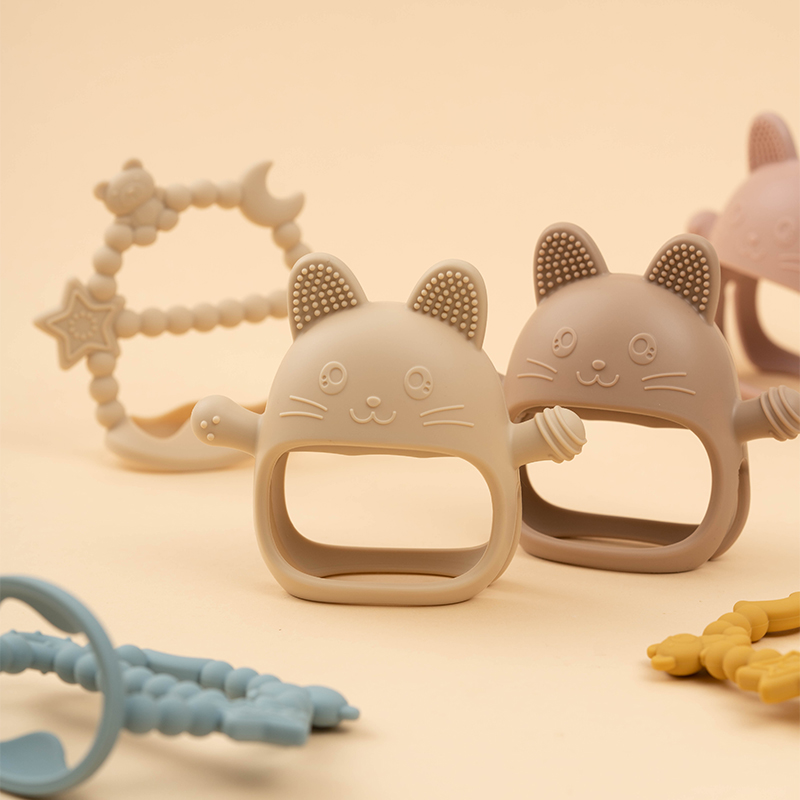 Baby Teething Toy Silicone Tee - огляд і ціна Teething Mitten Baby